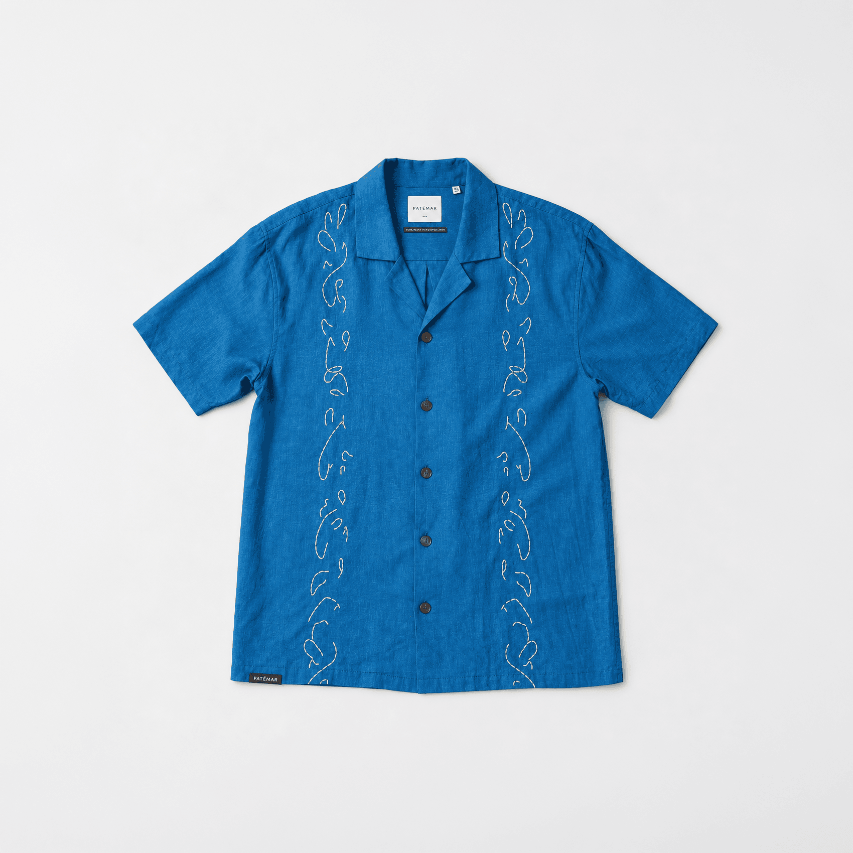 Blue short-sleeved shirt with embroidery down the front