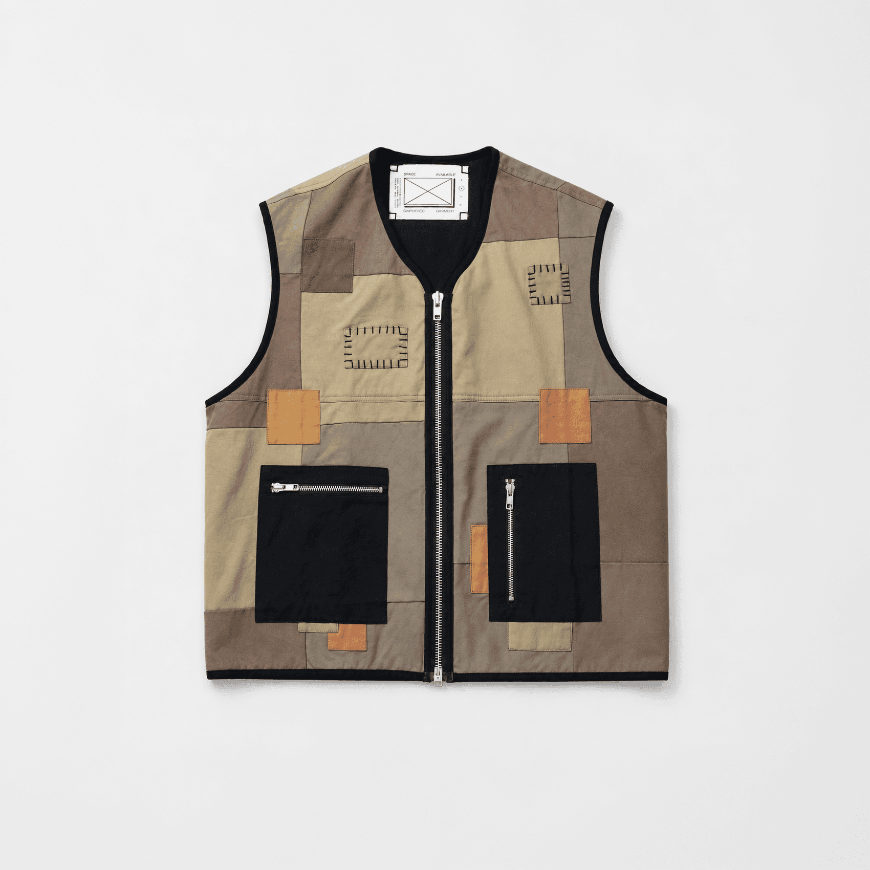 Patchwork vest with black zip pockets